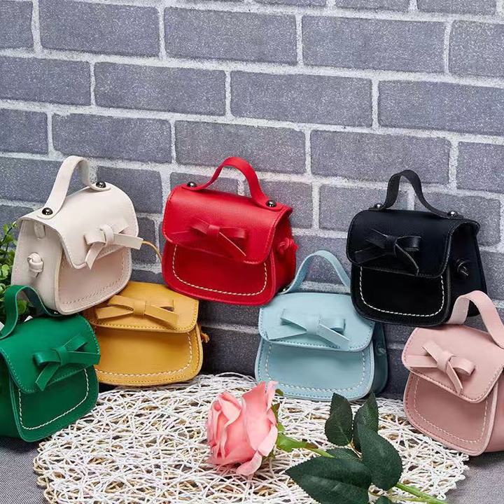 Adorable Children's Bowknot Mini Shoulder Bag - Cute PU Leather Crossbody Purse for Girls