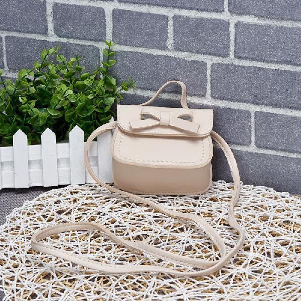 Adorable Children's Bowknot Mini Shoulder Bag - Cute PU Leather Crossbody Purse for Girls
